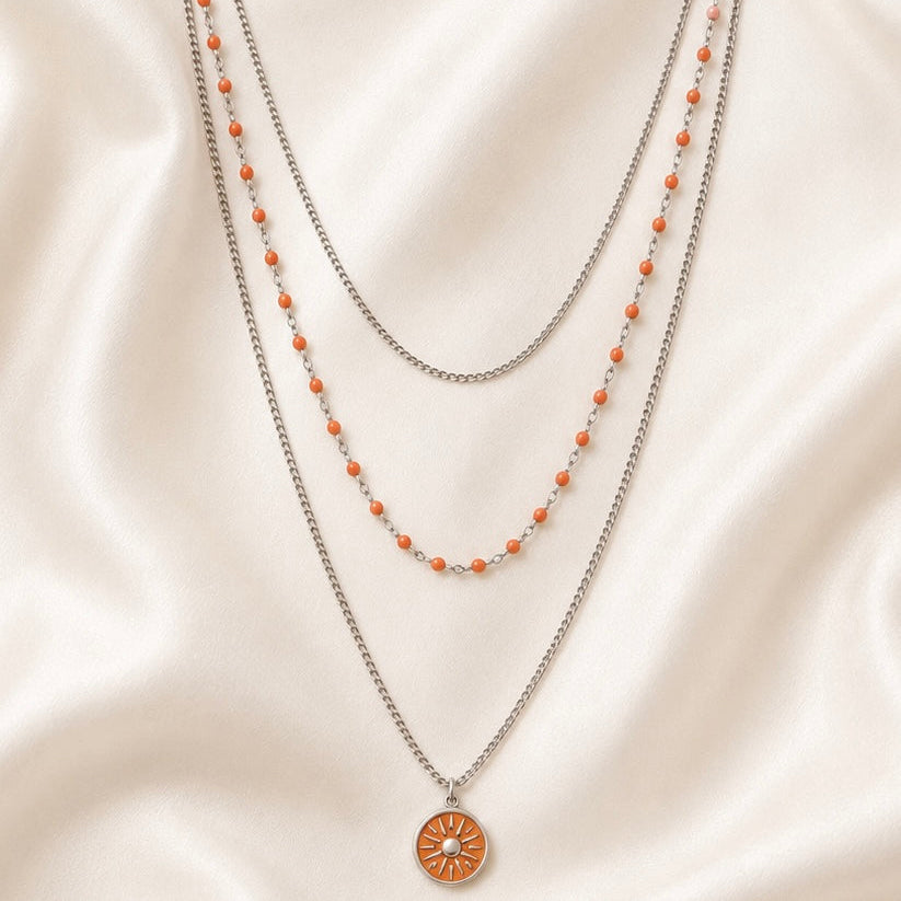 Collier triple rang en acier inoxydable – Pendentif Soleil Émaillé Orange