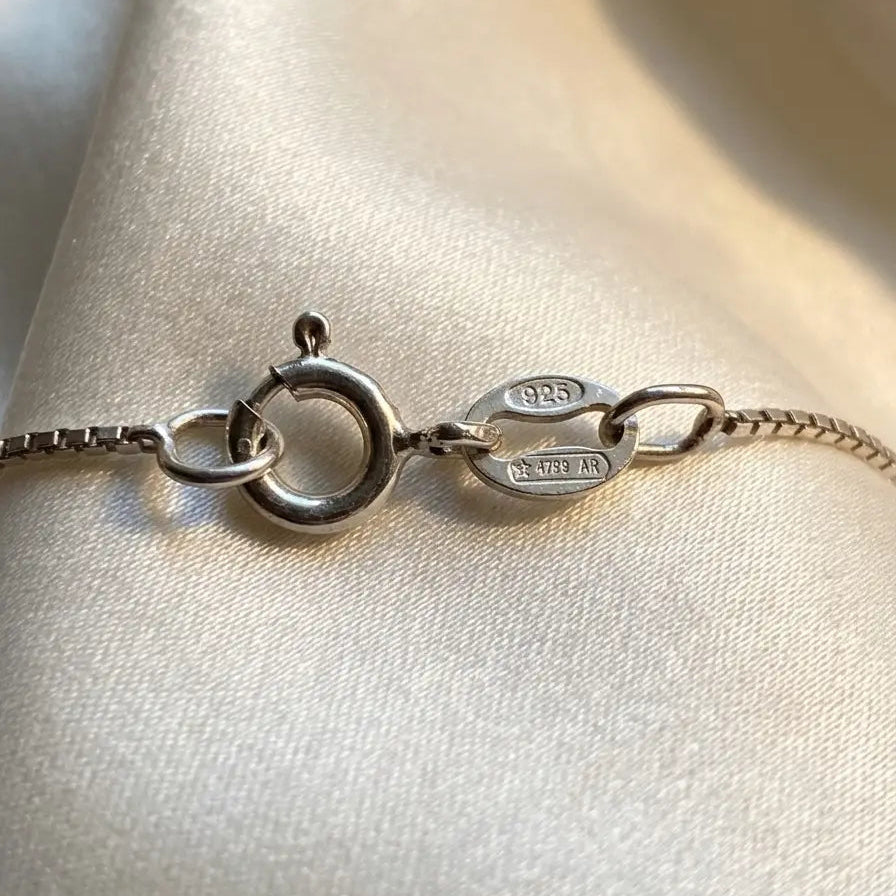 Collier Rosace Étoilée en Argent Rhodié – Pierre Lannier