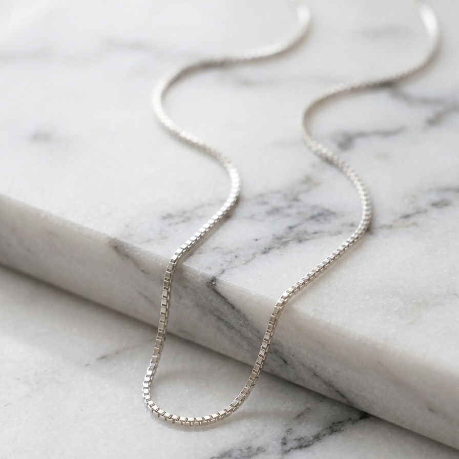 Chaîne maille carrée en argent rhodié – Pierre Lannier