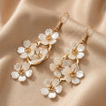 Boucles d’Oreilles Pendantes « Cascade Nacre & Or Floral »