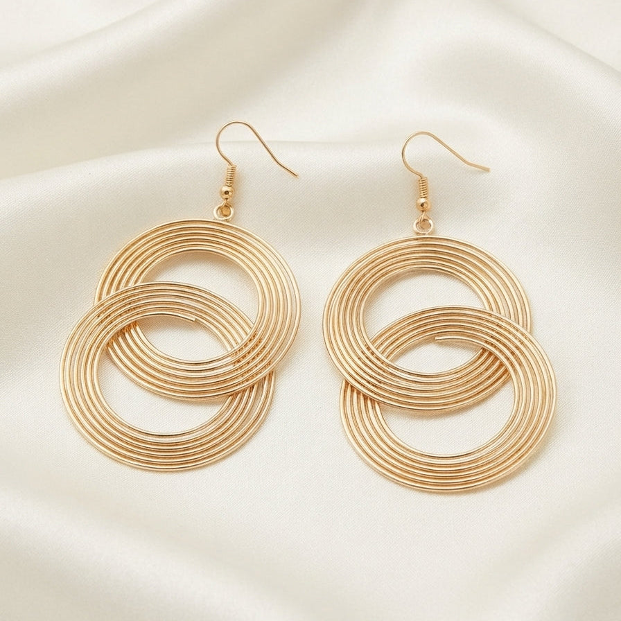 Boucles d'oreilles créoles entrelacées dorées