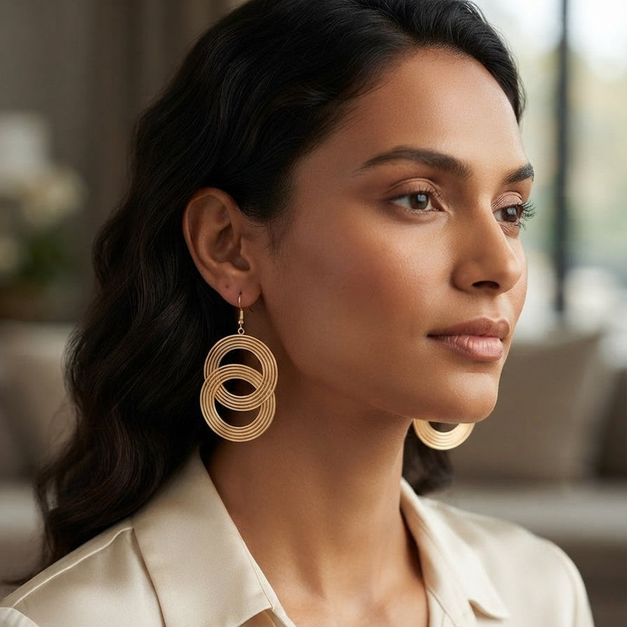 Boucles d'oreilles créoles entrelacées dorées