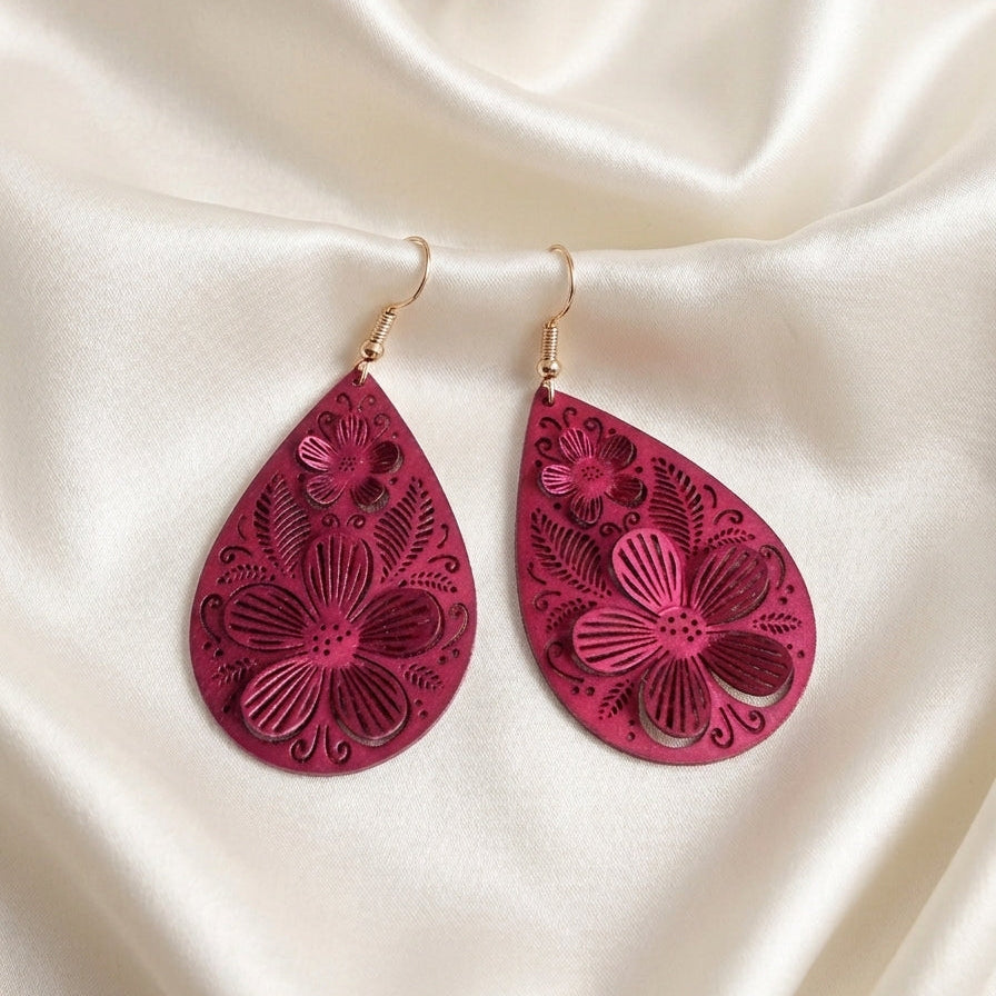Boucles d'oreilles pendantes fuchsia motif floral