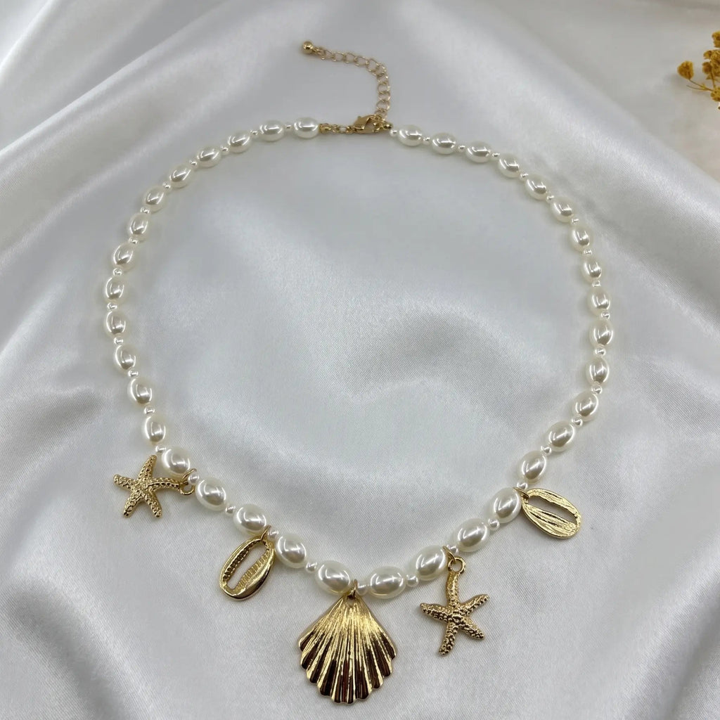 Collier Perles et Breloques Marines signé LH